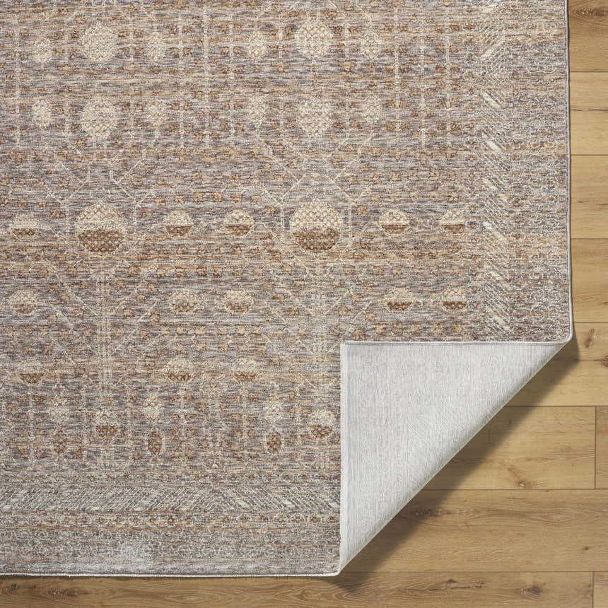 Close-up of the Vince Area Rug showing its farmhouse style, cream, dark red, gray, and tan colors and traditional pattern. Fold