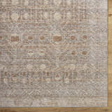 Close up of the Vince Area Rug showing its farmhouse design, cream, tan, gray, and dark red colors. Swatch