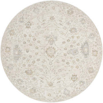 Close-up of the round Vaman Luxe Rug. Light silver and sterling gray traditional floral pattern. Design-Round-7
