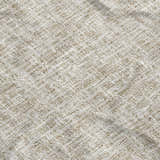 Close-up of the beige Dalyn Luxury Voyage VY1 Washable Area Rug, showing its woven texture and subtle pattern.