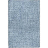 Close-up of the Dalyn Luxury Voyage VY1 Denim Washable Area Rug, showing its blue woven texture.