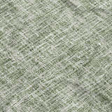 Close-up of the green woven texture of the Dalyn Luxury Voyage VY1 Fern Washable Area Rug.