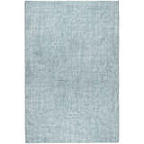Close-up of the Dalyn Luxury Voyage VY1 Sky Washable Area Rug. Sky blue woven texture, farmhouse style.