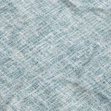 Close-up of Dalyn Luxury Voyage VY1 Sky Washable Area Rug featuring a textured, woven pattern in sky blue and white.