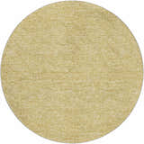 Close-up of a round Dalyn Luxury Voyage VY2 Wheat Washable Area Rug. Peach color and subtle texture.