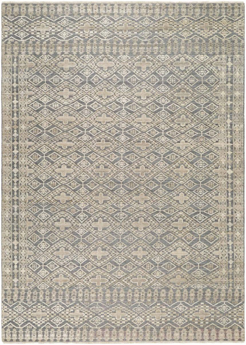 Close-up of the hand-knotted Woodsfield Premium Rug. Beige, brown, and gray diamond and cross pattern. Wool rug with traditional style. Design-Rectangle-576