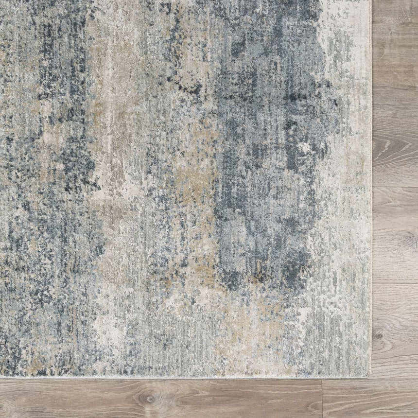 Close-up of the Whyalla Misty Thick Luxe Rug. Features dusty sage, light gray, navy, and taupe colors. Abstract design. Swatch