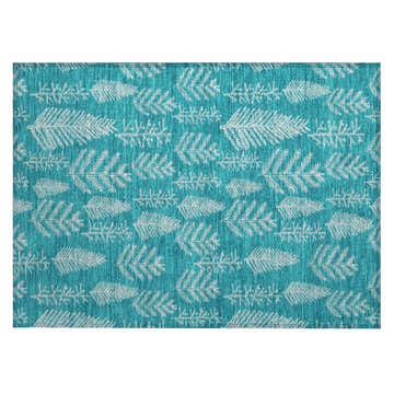 Close-up of Dalyn Wonderland WN21 Teal Washable Area Rug. Features a teal background with a white holiday leaf pattern.