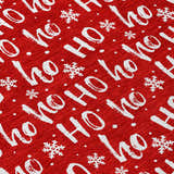 Close-up of the Dalyn Wonderland WN22 Red Washable Area Rug featuring a festive white Ho Ho Ho and snowflake pattern.
