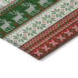 Close up of the Dalyn Wonderland WN26 Red Washable Area Rug. Holiday style with red, green, and white reindeer and snowflake pattern.