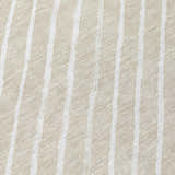 Close-up of the Dalyn Wonderland WN27 Beige Washable Area Rug with a subtle striped pattern.