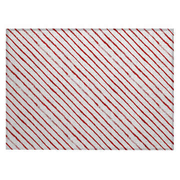 Close-up of the Dalyn Wonderland WN27 Red Washable Area Rug. Features red stripes on an off-white, textured background.