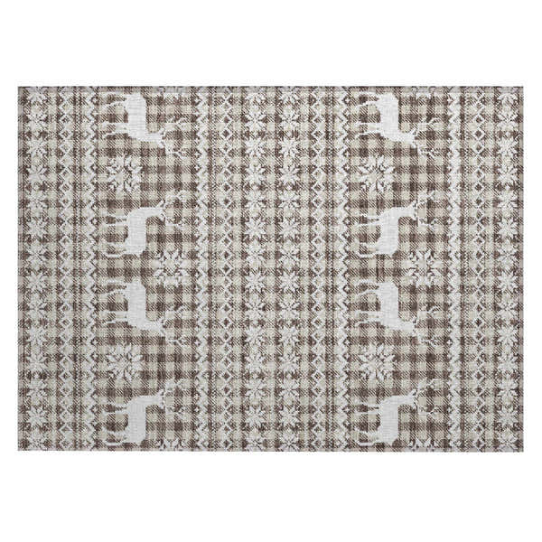 Close-up of Dalyn Wonderland WN28 Brown Washable Area Rug. Beige, chestnut, and dark brown plaid with reindeer and snowflake pattern.