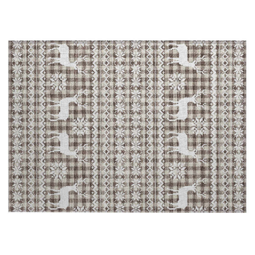 Close-up of Dalyn Wonderland WN28 Brown Washable Area Rug. Beige, chestnut, and dark brown plaid with reindeer and snowflake pattern.