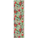 Dalyn Wonderland Aloe runner rug with nutcrackers, poinsettias, and ornaments pattern. Holiday style.