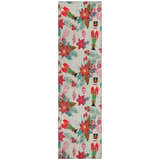 Close-up of Dalyn Wonderland WN30 Beige Washable Area Rug. Features nutcrackers, poinsettias, and ornaments on a beige background.
