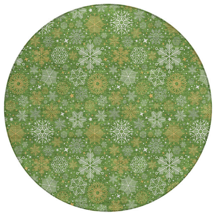Close-up of the round Dalyn Wonderland WN31 Green Washable Area Rug featuring a snowflake and star pattern in green, gold, and white.