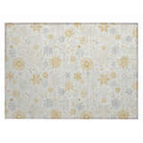 Close-up of Dalyn Wonderland WN31 Ivory Washable Area Rug with gold and taupe snowflake pattern.