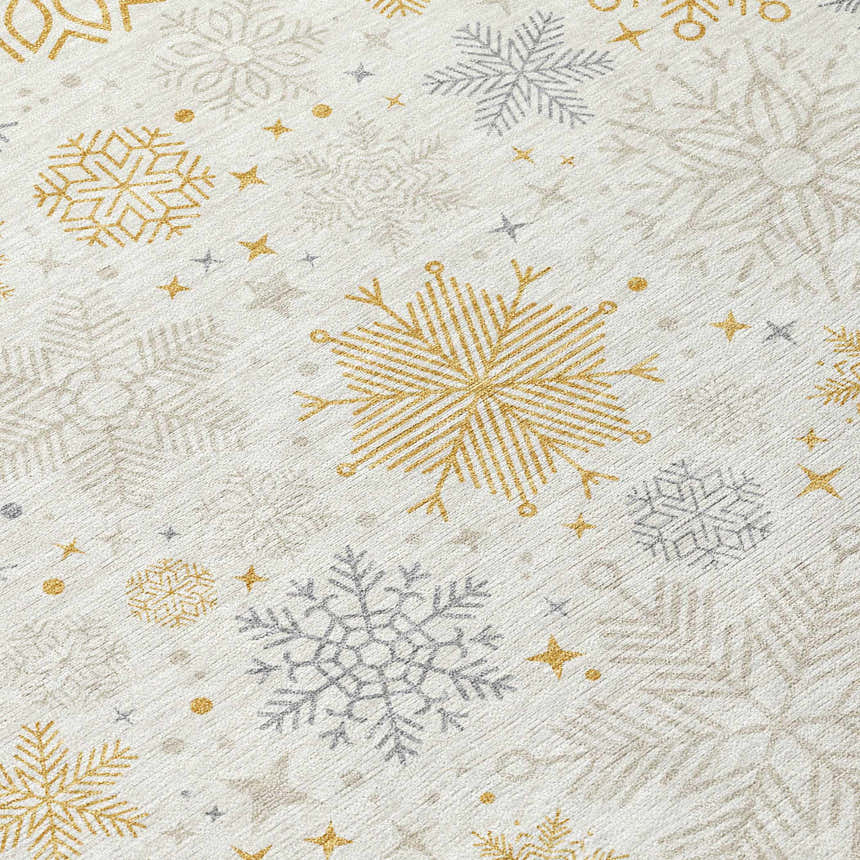 Close-up of Dalyn Wonderland WN31 Ivory Washable Area Rug with gold, taupe, and chestnut snowflake pattern.