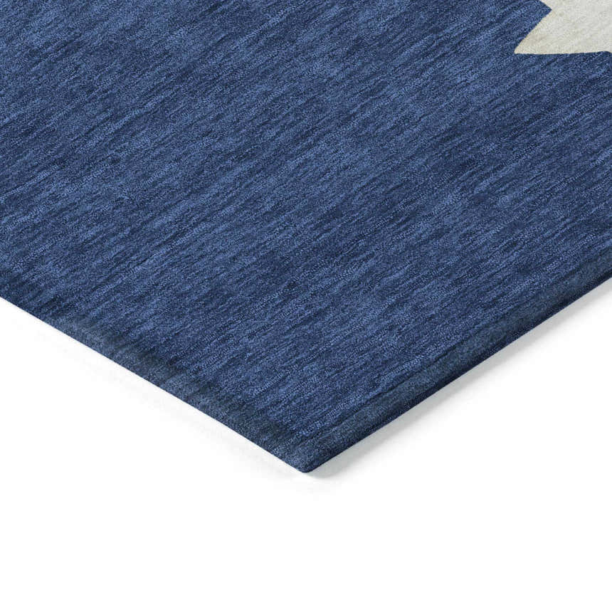 Close up of the Dalyn Wonderland WN33 Navy Washable Area Rug showing texture and corner detail.