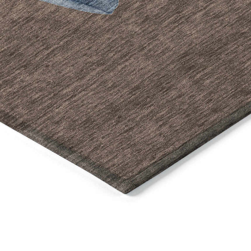 Close-up of the brown Dalyn Wonderland WN34 rug, showing its subtle texture and pattern. Washable, indoor/outdoor rug.