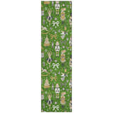 Close-up of the Dalyn Wonderland WN35 rug, featuring a green background with nutcrackers, ballerinas, and Christmas trees.