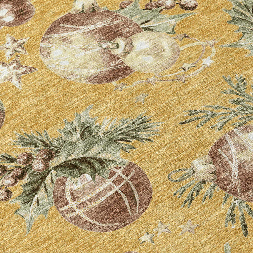 Close-up of Dalyn Wonderland WN36 Gold Washable Area Rug featuring holiday ornaments and pine branches on a gold background.