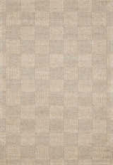 Close-up of the Wolseth Area Rug showing a hand-woven, textured, geometric block pattern in ivory and gray. Design-Rectangle-46