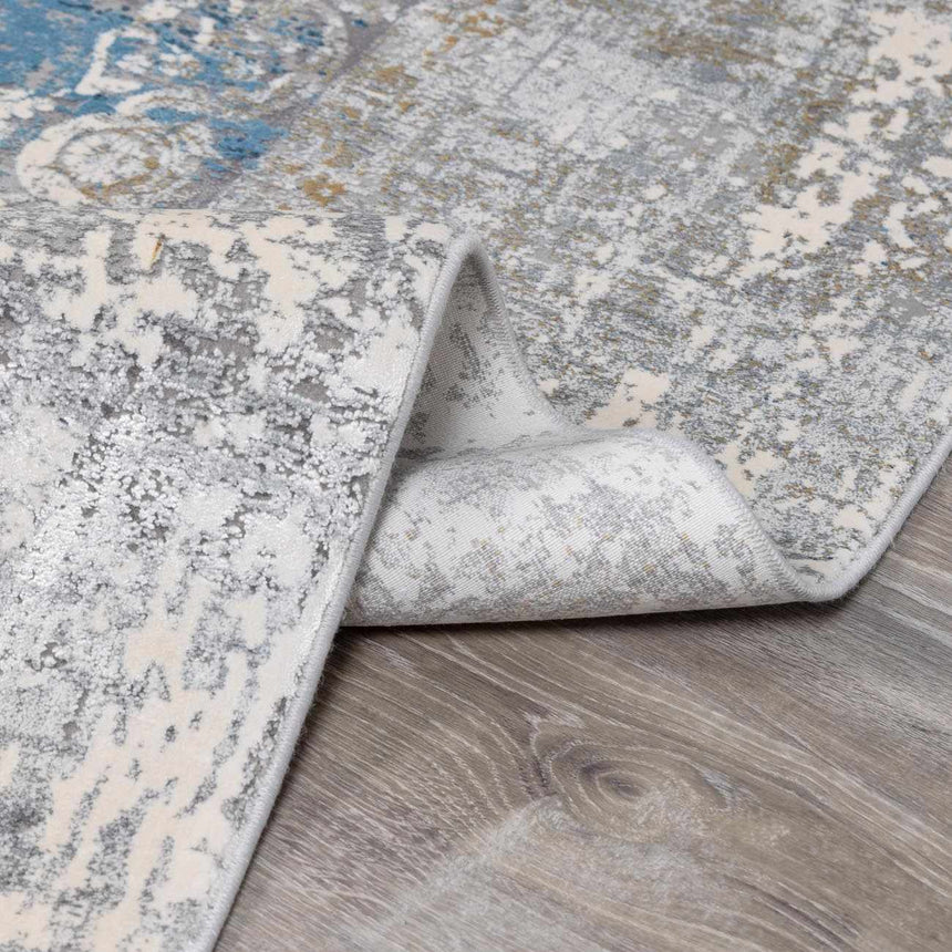 Calion Distressed Blue Luxury Fringed Faux Silk Rug