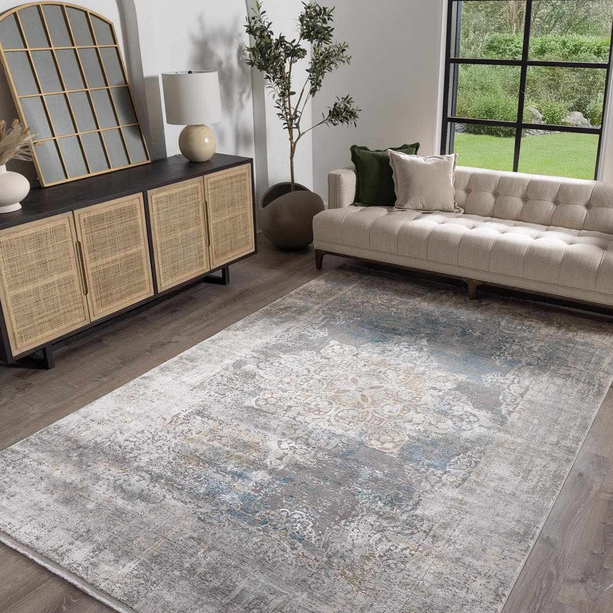 Calion Distressed Blue Luxury Fringed Faux Silk Rug