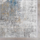 Calion Distressed Blue Luxury Fringed Faux Silk Rug