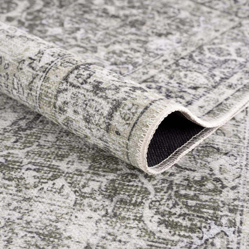 Close-up of the Gray Holi-4607 Washable Area Rug showing its traditional vintage pattern and soft texture. Fold