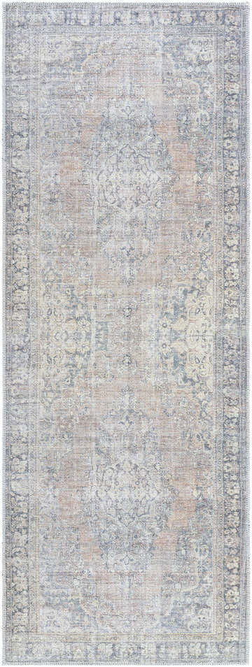 Close-up of the Yachi Washable Area Rug. Farmhouse style rug in gray, silver, and prairie dust colors with a traditional pattern. Design-Runner-2773