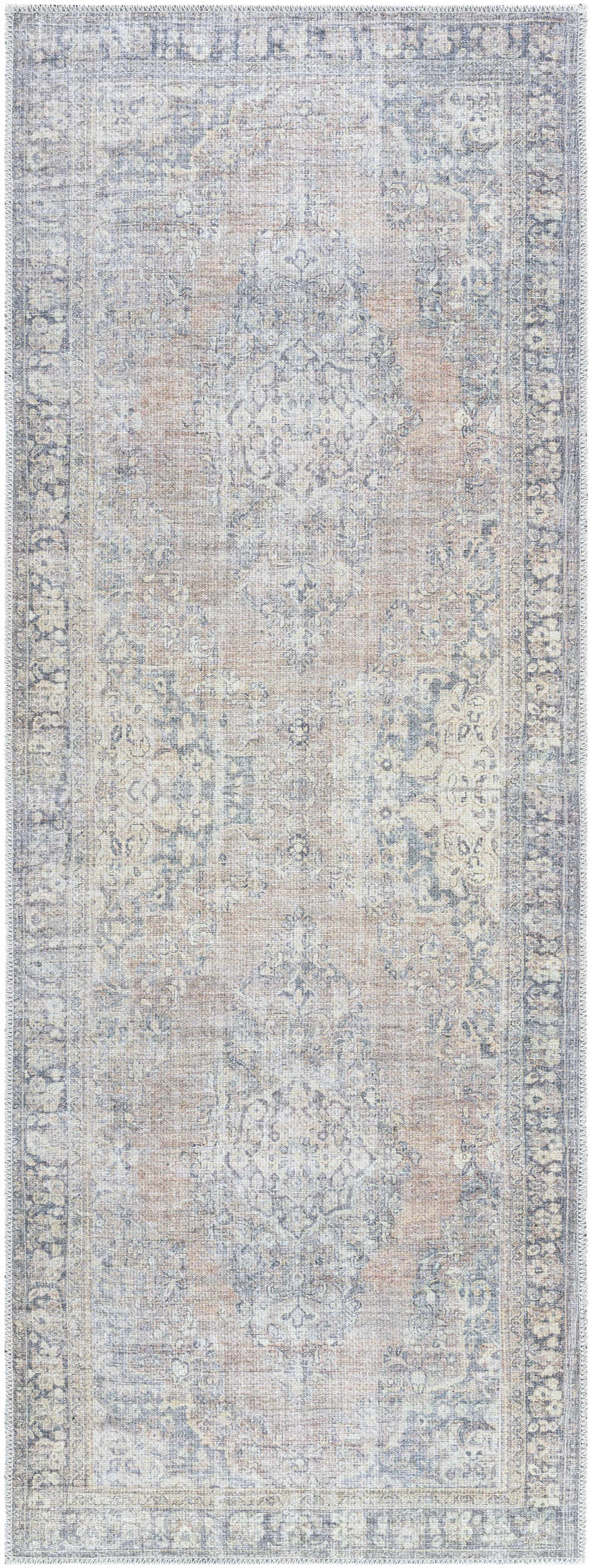 Close-up of the Yachi Washable Area Rug. Farmhouse style rug in gray, silver, and prairie dust colors with a traditional pattern. Design-Runner-2773