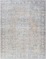 Close-up of the Yachi Washable Area Rug. Traditional style rug in gray, silver, and prairie dust colors with a subtle floral pattern. Design-Rectangle