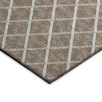 Close-up of Dalyn Machine Indoor/Outdoor York YO1 Taupe Washable Area Rug with a beige and ivory geometric plaid pattern.