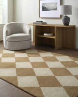 Living room scene with a tan and ivory Isaac Handmade VVIS-2300 wool rug, light chair, and console table. Roomscene-Rectangle