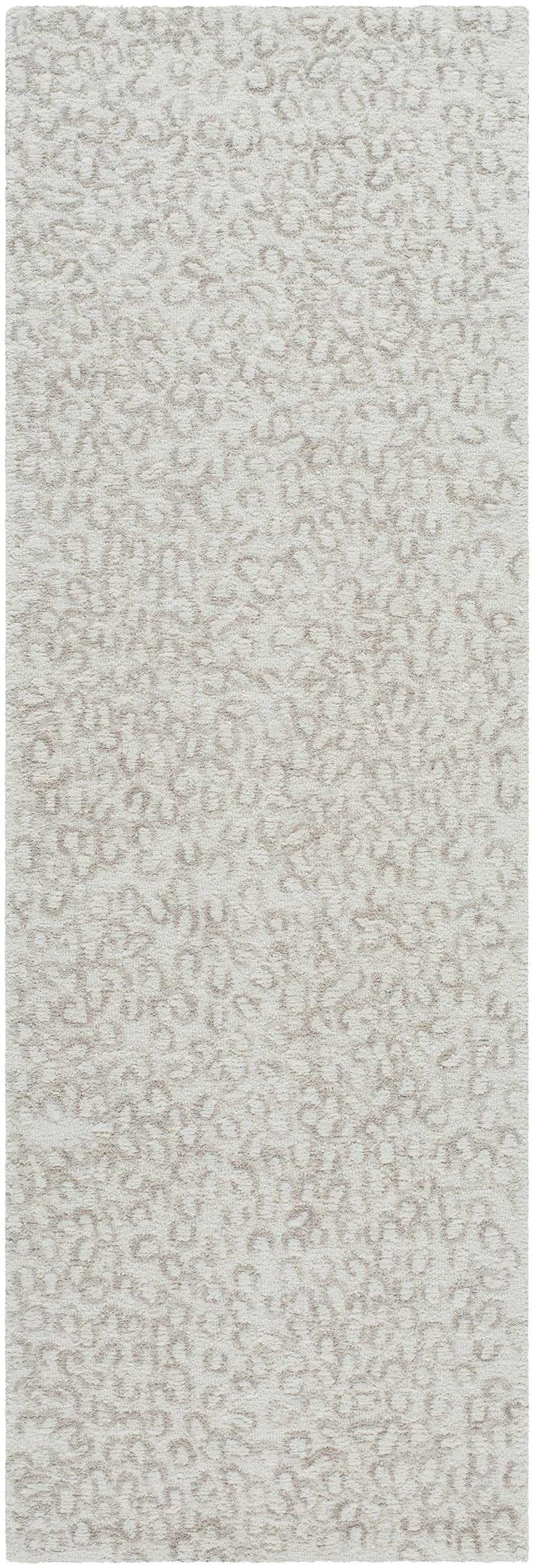 Close-up of the hand-tufted Zayit Area Rug. Light silver wool rug with a subtle sterling gray contemporary pattern. Design-Runner-268