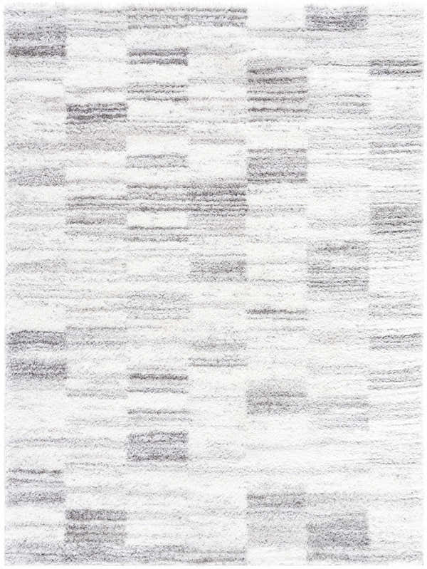 Close-up of the Alaura Area Rug, a shag rug with a contemporary ivory and peach block pattern and soft texture. Design-Rectangle-537