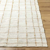 Close-up of the hand woven Zared Checkered Jute Area Rug showing its ash color and farmhouse style. Front