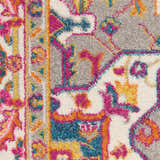 Close up of the Nourison Passion Teal Multicolor rug, showing its bohemian pattern and texture.