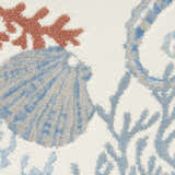 Close-up of Nourison Seaside Ivory Multicolor rug with coral, seashell, and sea plant pattern. Coastal style.
