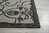 Close up of the ivory and charcoal Nourison Country Side area rug showing the floral pattern and texture.