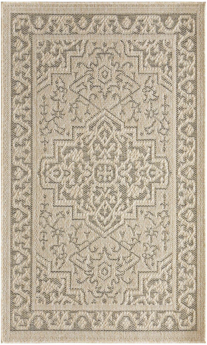 Close-up of Nourison Tulum Taupe Olive outdoor rug. Machine-made pile with ivory and olive geometric pattern.