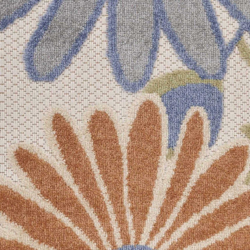 Close-up of Nourison Aloha Beige Multicolor rug, featuring floral pattern in beige, brown, blue, and green hues.