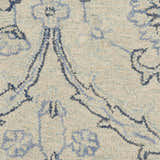Close up of the Nourison Jazmine rug in ivory and blue. Wool rug with a detailed Persian design.