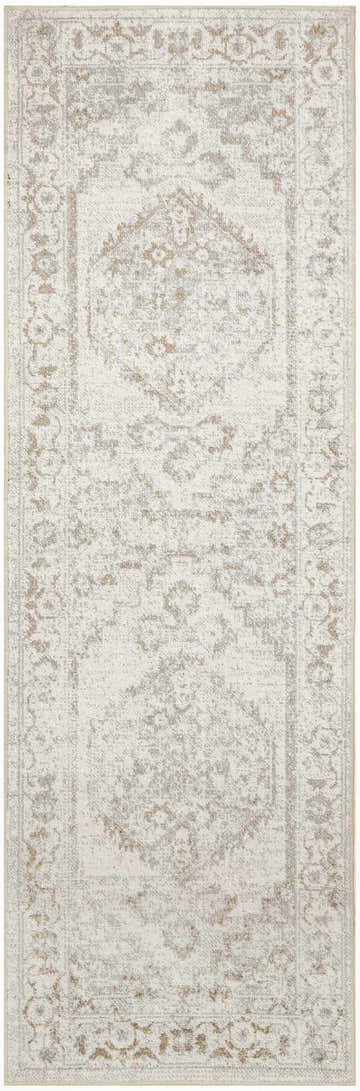 Close-up of the Nourison Astra Grey Vintage Rug. Machine-made with a subtle distressed pattern and neutral colors.