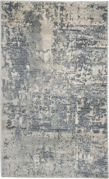 Close-up of the Nourison Quarry Grey Beige rug, showing its abstract pattern and soft gray and beige colors.