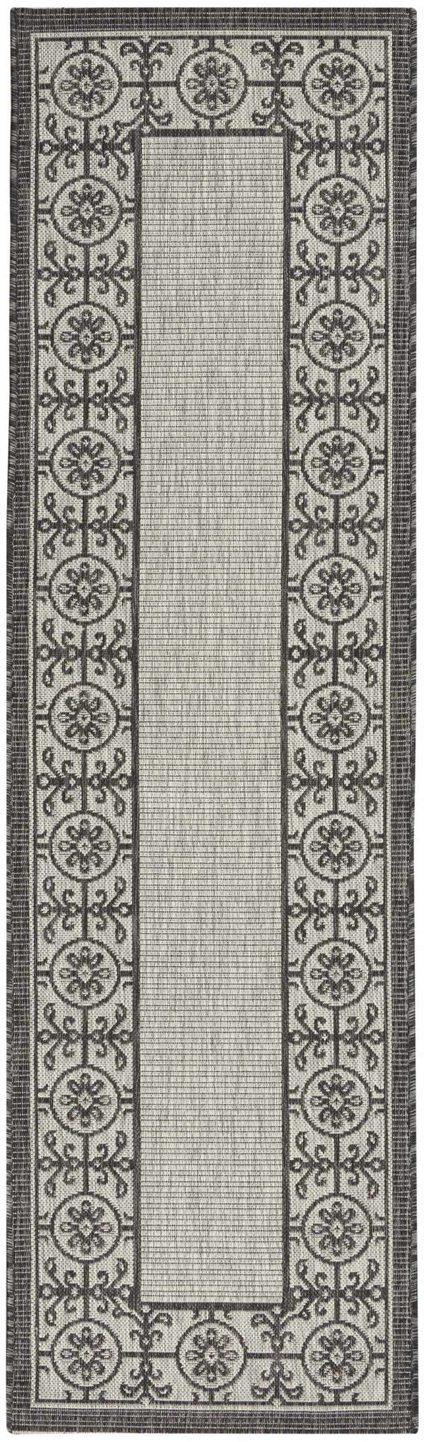 Close-up of Nourison Country Side Ivory/Charcoal rug. Transitional farmhouse style with floral medallions and taupe tones.