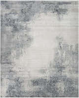 Close-up of the Nourison Dekor Grey Navy rug featuring a modern geometric pattern and high pile texture.